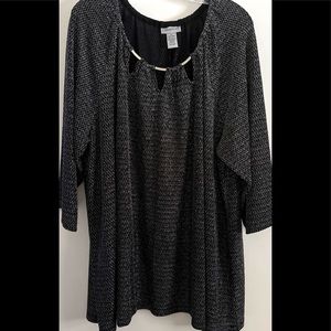 Metalic, blk/silver beauty. Designer neckline. In brand new cond. Quality piece